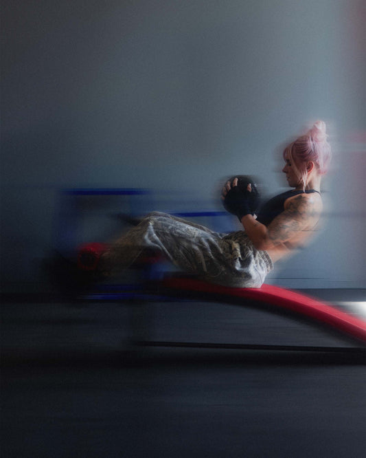 woman doing lower ab exercise